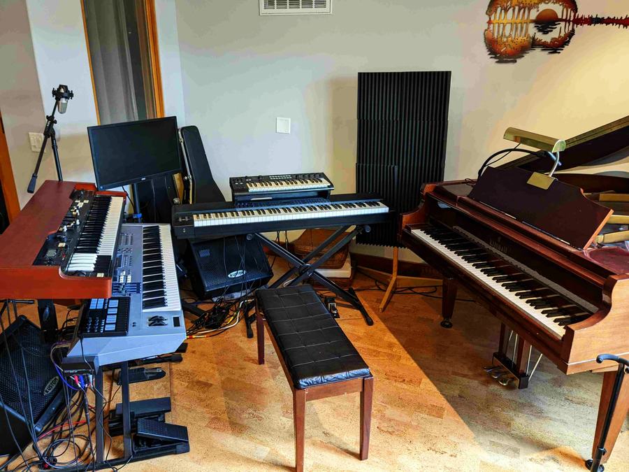 Keyboard room at Hummingbird MPC — grand piano, synths and keys