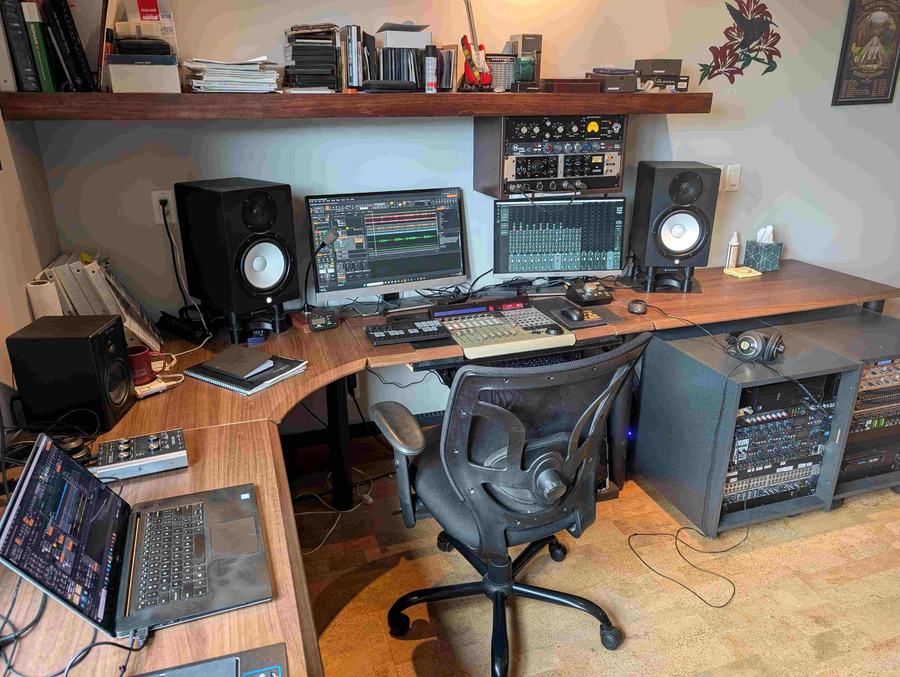 Production suite at Hummingbird MPC — mixing desk, monitors and rack gear